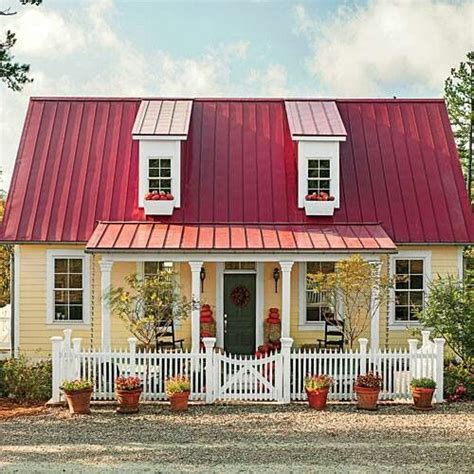 yellow house red metal roof|yellow house with gray roof.